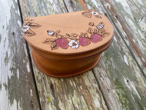 leather bag with strawberries